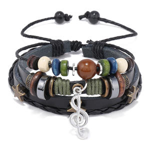Bracelet réglable tendance en cuir avec perles en bois motif note de musique, design de niche, style bohème <span class=keywords><strong>hippie</strong></span>, bracelet vintage superposé en corde - Product Image 1