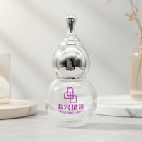 Flacon en verre plat transparent de 30 ml en forme de gourde avec bouchon à vis argenté, personnalisable par sérigraphie pour produits essentiels