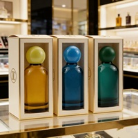 Flacon de parfum en verre rond moderne de luxe haut de gamme, écologique, recyclable, personnalisé, 50 ml, avec vaporisateur