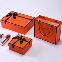 Boîte d'emballage cadeau de Noël 2 pièces avec couvercle et base orange imprimé de logo personnalisé en gros pour emballage cosmétique
