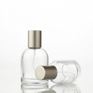 In Stock 30ml Round Belly <b>Glass</b> Perfume <b>Bottles</b>, <b>Empty</b> Refillable Spray Containers with Electroplated Aluminum Caps - Product Image 1