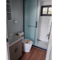 Maison mobile de luxe sur roues, cabine préfabriquée en conteneur à grain de bois pour villas de jardin et séjours en station balnéaire