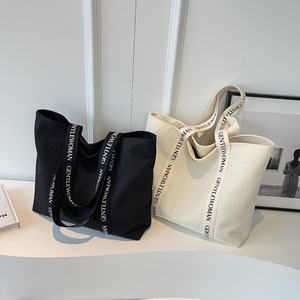 Bolso de mano deportivo de lona de algodón con logotipo impreso y correa de marca personalizada para gimnasio - Product Image 1