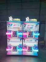Machine à griffes mini 4 joueurs sur le thème de l'espace, machine de jeu d'arcade compacte avec cabinet métallique, machine à griffes à jouets pour centres commerciaux et salles de jeux