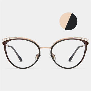 Montura de gafas ópticas de ojo de gato bicolor para mujer con protección contra la luz azul, patillas de metal con resorte, diseño ovalado y puente medio. - Product Image 1