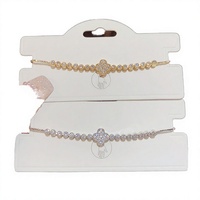 Bracelet de fête élégant unisexe en acier inoxydable plaqué or 18 carats avec breloque papillon et cœur en zircon, idéal pour les couples - Collection Love Bow MoLin