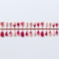 Faux ongles courts à porter, forme amande, effet œil de chat rose-rouge, design papillon 3D, haute qualité, effet éclaircissant, pour le marché international