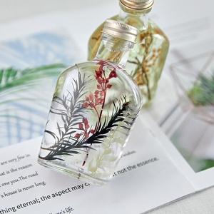 Bottiglie di Vetro con Fiori Secchi Naturali Galleggianti in Olio, Decorazione Originale per Natale e San Valentino - Product Image 2