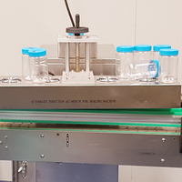 Machine de scellage par induction thermique de feuille d'aluminium de bouchon continu de revêtement de bouteille en plastique électromagnétique automatique de vent froid
