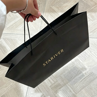 Sac shopping en papier noir mat avec logo en feuille d'or personnalisé, poignée en corde de papier torsadée, emballage cadeau de luxe pour boutique, sac fourre-tout