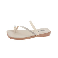 H-08 2025 pas cher style simple Flip Toe pantoufles pour femmes plage sandales plates diamant anneau croix sangle PU cuir diapositives