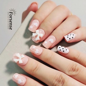24 pcs vente en gros de <span class=keywords><strong>faux</strong></span> ongles roses coeurs blancs avec breloques arcs 3d ongles artificiels de luxe points noirs nouveau design - Product Image 2