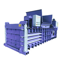 Machine de compactage et d'ensachage horizontale hydraulique pour la recyclage des coques de riz