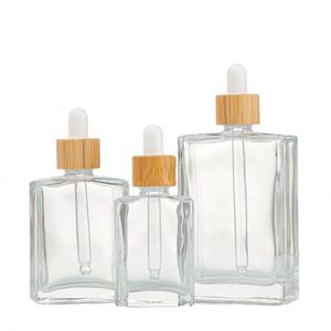 30ml 50ml 100ml Rectangle Clear Glass Serum <b>Dropper</b> <b>Bottles</b> Skin Care Essential Oil Gold Sliver Bamboo Cap Screen Printed Custom - Product Image 2
