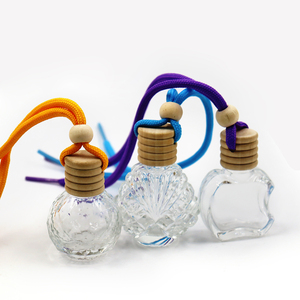 Flacon de parfum vide en verre transparent de 5 ml et 8 ml pour diffuseur d'air frais de voiture avec couvercle en bois et cordon coloré - Product Image 1