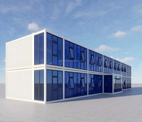 Bureau modulaire élégant à deux étages en conteneur préfabriqué avec mur-rideau en verre bleu, respirant, à assemblage rapide, pour la construction de villas préfabriquées