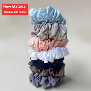 Aangepaste Kleuren Logo Elastische Haarbanden Milieuvriendelijk Nieuw Materiaal Bamboe Zijde Scrunchies Voor Vrouwen Meisjes