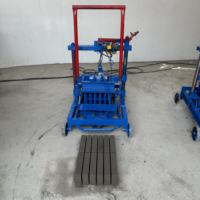 Machine automatique à briques de ciment avec moteur de pompe PLC et extrudeuse à engrenages sous vide pour la fabrication de blocs creux de divers types de briques