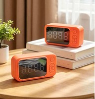Réveil numérique LED miroir en gros d'usine avec haut-parleur 1200 mAh, prend en charge la carte TF, idéal pour chambre à coucher, hôtel, promotion d'entreprise, cadeau