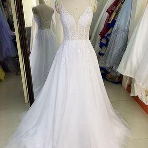 Vente en gros Corset transparent ivoire col en V sans manches broderie une ligne <span class=keywords><strong>de</strong></span> robes <span class=keywords><strong>de</strong></span> <span class=keywords><strong>mariée</strong></span> blanches - Product Image 1