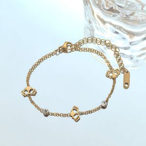 <span class=keywords><strong>Bracelet</strong></span> en acier inoxydable avec pendentif trèfle et pompon pour femme – Nouvelle collection, élégant et polyvalent – Composants de bijoux en gros - Product Image 4