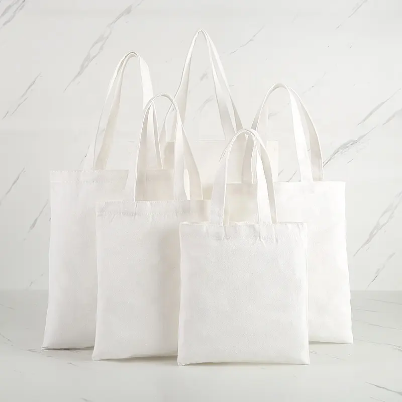 थोक कस्टम इको 12 औंस सादे सफेद कपास भारी कैनवास टोटे बैग कस्टम लोगो मुद्रित खरीदारी के साथ