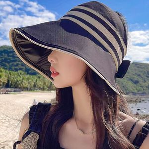 Sombrero de pescador negro a rayas con ala ancha, protección solar UV, sombrero de playa para mujer - Product Image 1