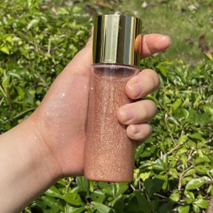 MLM 50ml Cylinder Shimmer Body Oil Gold Cap Water-Based Formula Long Lasting Nourishing Private Label brightening body oil - Product Image 1