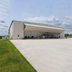 Лидер продаж, электрические двухскладные подъемные двери для самолетов, вертикальные двухскладные гаражные двери, сверхпрочные складные гаражные двери - Product Image 3