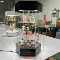 Vente en gros d'usine Vitrine rotative hexagonale en acrylique avec étagères rondes à niveaux, système d'éclairage LED supérieur et porte verrouillable
