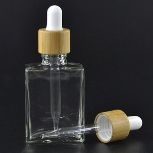 Frasco cuentagotas de botellas de vidrio transparente de aceite esencial de 30ml con tapa de Bambú - Product Image 4