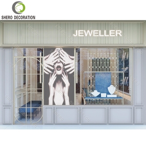 Vitrine à bijoux moderne en verre bleu avec éclairage LED, idéale pour la décoration de bijouterie. - Product Image 6