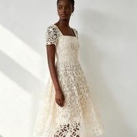 Tissu en dentelle soluble dans l'eau à motif floral blanc ajouré brodé pour robe de mariée ou de soirée