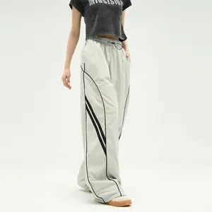 Pantalon de survêtement de marque Streetwear personnalisé en polyester pour hommes, droit surdimensionné, à rayures latérales