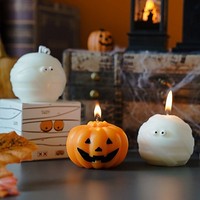 Handgefertigte kreative Duftkerzen in Kürbisform für Halloween, als Geschenk für die Feiertage und zur Heimdekoration im Großhandel.