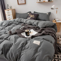 Parure de lit de luxe gris pour 2 chambres, comprenant housse de couette, couvre-lit et drap-housse, disponible en tailles Queen et Super King, avec couette en duvet.