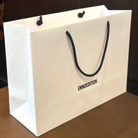 Maßgefertigte Umweltfreundliche Luxus-Papiertüte mit UV-Logo-Laminierung aus Recyclingmaterialien für Boutique-Verpackungen