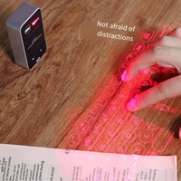 Nuevo diseño Teclado de proyección láser Teléfono móvil Computadora Teclado virtual infrarrojo inalámbrico