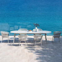 Ensemble table et chaises de salle à manger d'extérieur nordique, structure en aluminium épais, chaise en sangle d'oléfine, plateau en pierre frittée, mobilier de patio