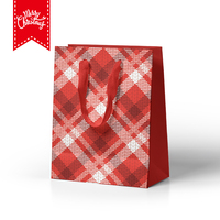 Bolsa de regalo de papel Kraft de Navidad personalizada con asa Embalaje personalizado de fábrica para fiestas Esquema de color rojo y blanco