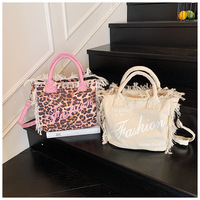 Summer Hot Sell Women Leopard Canvas Fringe Portable Travel Handbag Fashion Luxury European Letters Tassel Beach Tote Purse