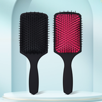 Peigne magique personnalisé de peinture élastique de pulvérisation d'ABS cheveux noirs brosse personnalisée de palette de coussin de couleur avec le logo pour des hommes femmes
