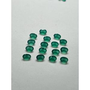 พลอยออนิกซ์สีเขียวธรรมชาติ รูปไข่ ขนาด 6x8 มม. แบบเม็ดเดี่ยว |   หินออนิกซ์สีเขียวเจียระไนสำหรับทำเครื่องประดับ |   ผู้จัดจำหน่ายสินค้าขายส่ง - Product Image 1