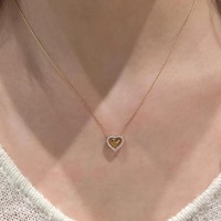 Colliers élégants pour femmes avec pendentif cœur délicat et chaîne fine, vente en gros de bijoux TGXL14780