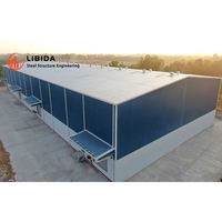 Hangars d'entrepôt en acier durables et personnalisables à prix abordable pour installations industrielles