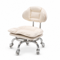 Chaise de salon minimaliste moderne avec dossier en métal, pivotante sur roulettes, fauteuil bas pour salon