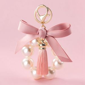 Thời Trang Xe Keychain Phụ Kiện Ngọc Trai Fringe Kim Loại <span class=keywords><strong>Key</strong></span> <span class=keywords><strong>Ring</strong></span> Với <span class=keywords><strong>Bow</strong></span> Củ<span class=keywords><strong>a</strong></span> Phụ Nữ Treo Mặt Dây Chuyền - Product Image 4