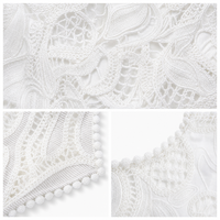 Chemisier élégant pour femme en pur coton blanc à motif cachemire, sans manches, col rond, avec pompons et boutons au dos