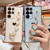 Coque de téléphone Bracelet coeur d'amour plaqué élégant pour Samsung S25 Ultra S24 Plus S23FE Silicone souple avec chaîne A17 A36 A55 A56 A16
