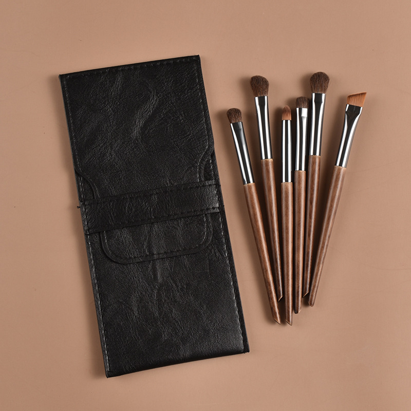 Bolsa negra + cepillo